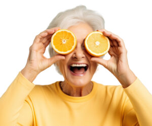 Cum crești aportul de vitamine din surse naturale pe perioada verii la persoanele vârstnice PNG Holding adult women fruit. AI generated Image by rawpixel.